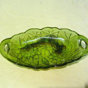 VTG GREEN GLASS EMBOSSED OVAL DISH W/HANDLES, FLOWERS & STAR PATTERN